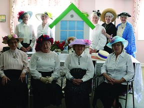 The Eastside Grannies with Marilyn Scott from the Keiskamma Foundation dressed in early 1900s clothing to promote the Spirit of Green Gables Rhubarb Coffee Party and Afternoon Concert taking place Sunday, June 23. Top row, left to right: Rose Keiller, Imrie Parker, Ruth Lineker, Carol Maier, and Marilyn Scott. Bottom row, left to right: Lily Willows, Sally Foss, Colleen Middleton, Joyce Armstrong. Steven Wagers/Sherwood Park News/QMI Agency