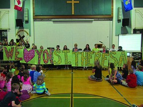 Students bid farewell to the old St. Theresa Catholic School building, which will be closing at the end of the school year. Photo Supplied