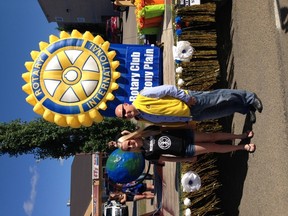 Taylor Rocque, left, and Stony Plain Rotary Club president Michael Thomas at the Farmers’ Day Parade. - Photo Submitted