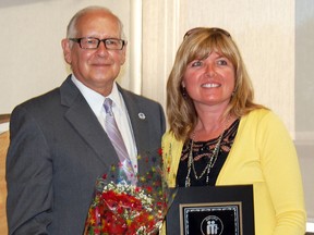 Tillsonburg Mayor John Lessif was on hand Tuesday for the presentation of the CAS Oxford Jack Ross Memorial Award to Tamara Bull (right), annually presented to  a person who has performed outstanding service beyond the call of duty to children and/or families of Oxford County. KRISTINE JEAN/TILLSONBURG NEWS