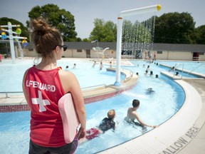 A lifeguard stands watch at the Thames public pool in London Friday. CRAIG GLOVER The London Free Press / QMI AGENCY