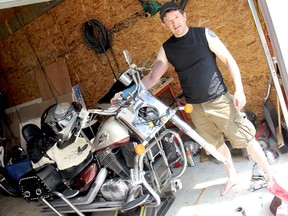 Tony Verhoeven of Chatham is urging motorcycle riders to always be safe on the road after suffering a bruised body and a fractured wrist from a near-fatal collision with a bear. On June 14, Verhoeven struck the bear traveling 60 miles per hour, while on vacation in Gorham, New Hampshire.  KIRK DICKINSON/FOR CHATHAM DAILY NEWS/ QMI AGENCY