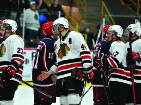 Brockville Braves players shake hands with the Cornwall Colts following the end of their CCHL Jr. A first-round playoff series in March. The league has announced a new set of player fees for the 2013-2014 season. (RECORDER AND TIMES FILE PHOTO)