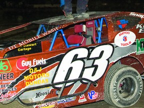Chris Herbison celebrates after winning the 2011 Sportsman Division title at Brockville Ontario Speedway. Herbison is the two-time defending division champion at the BOS, having also won the 2012 title. (HENRY HANNEWYK Recorder and Times file photo)