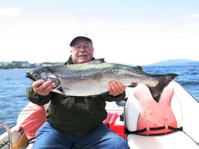 Neil with a 12-pound Chinook caught near Campbell River. (SUPPLIED)