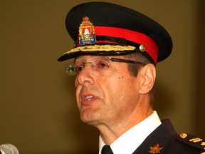 Gilles Larochelle speaks during a ceremony at city hall Friday where he is sworn in as chief of police for the Kingston Police Force. 
Danielle VandenBrink/The Whig-Standard