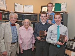 J. Robert Hillier (left), son of the late Dr. James Hillier, and his aunt May Hillier of Brantford stand with Kyle Szczur of St. John's College, Liam Flannigan (rear) of North Park Collegiate, and Timothy McDougald (right) of St. John's College. Each of the graduating high school students were selected to receive scholarships from The James Hillier Foundation, awarded annually to the top three high school science students who plan to pursue studies in science at university. (BRIAN THOMPSON Brantford Expositor)
