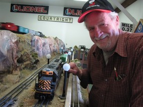 Del Knight is shown with the Lionel Model Train Exhibit he and other volunteers assembled in the Shaw Building at the Moore Museum in Mooretown. The exhibit, and a recently completed general store, will official open Sunday, with special activities and refreshments from 1:30 p.m. to 4 p.m. Admission is free Sunday and an opening ceremony is scheduled for 2:30 p.m. PAUL MORDEN/THE OBSERVER/QMI AGENCY