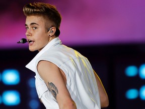 Justin Bieber performs on stage during a concert as part of his "Believe" World Tour at the Sevens Stadium in Dubai in this May 4, 2013, file photo. REUTERS/Jumana El Heloueh/Files