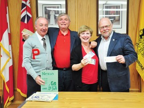 At least four people will be in attendance at this year's Pembroke Collegiate Institute (PCI) school reunion, slated for Sep. 5-8, as Pembroke councillors Les Scott, left, and Gary Severin and Pembroke Mayor Ed Jacyno, right, officially handed their $15 registration fees to reunion committee chairwoman Joyce Moore Cowan at city hall. The September reunion will be the school's third ever, and the first in nearly 25 years.