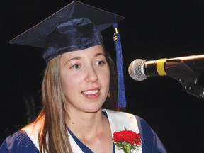 Marianne Gagnon, valedictorian of Jeanne-Lajoie's Class of 2013, addresses her peers Thursday evening, during convocation ceremonies held at the school. A total of 50 students assembled to collect their diplomas.