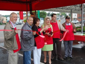 Sudbury Mayor Marianne Matichuk, centre, is joined by councillors Dave Kilgour, Ron Dupuis, Frances Caldarelli, Fabio Belli and Claude Berthiaume as she cuts the ribbon to open the new downtown market.
