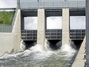 The flood gates at the Twin Valley Reservoir Dam were opened Friday morning.