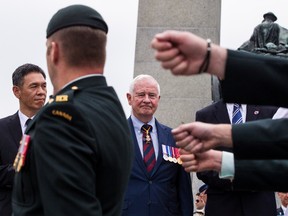 Korean War Veterans parade past Govenor General David Johnston following a  commemorative wreath-laying ceremony at the National War Memorial in Ottawa on the occasion of the 60th anniversary of the outbreak of the Korean War. June 23,2013.  
Errol McGihon/Ottawa Sun file photo