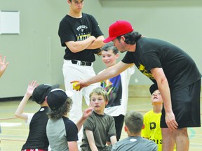 Nick Cameron asks minor baseball players what they learned at the conclusion of the Baseball Manitoba five-tool player camp on June 23 in Southport. (Kevin Hirschfield/THE GRAPHIC/QMI AGENCY)