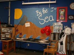 Showcasing Thickwood Heights School’s long history with promoting the arts, Thursday’s arts-focused programming announcement was paired with displays around the school depicting more then 25 years of Thickwood Theatriks performances, like this By the Sea display in the library. Amanda Richardson/Today Staff