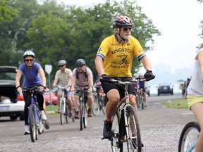 Cyclists leave Douglas Fluhrer Park Sunday during the Shoreline Shuffle event. Participants trekked 7.7 kilometres of Kingston's shoreline to promote a more integrated, accessible plan for the waterfront. (Danielle VandenBrink/The Whig-Standard)