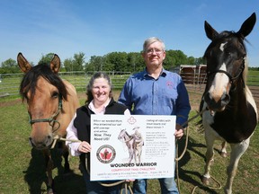 Jayne and Chuck Cannon with their horses at their Williamsford home. They are organizing the Wounded Warrior Competitive Trail Challenge at Land Force Central Area Training Centre Meaford on Aug. 24. (JAMES MASTERS The Sun Times)