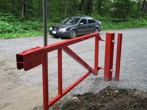 These gates will soon swing shut on South Walsingham Concession Road 4 between Highway 59 and the East Quarter Line. When they do, the two-kilometre stretch will become the third unmaintained road in Norfolk declared off-limits to the road-travelling public. (MONTE SONNENBERG Simcoe Reformer)
