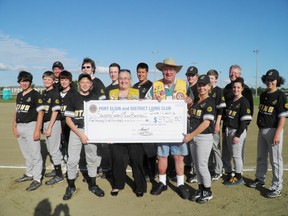 Pictured are the Saugeen Shores Bantam Sting that is sponsored by the Port Elgin Veterinary clinic, accepting the cheque from Lions Club members Kathy Buckle and Eric Eastwood.