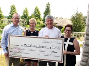 The Woodstock Lions Club's 2nd annual Variety Show raised $5,000 for VON Sakura House. From left to right: VON Oxford board president John Goodbun, Jackie Newton, Steve Newton and Kendra Hitchman. CODI WILSON/Sentinel-Review