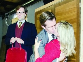 Brett Christopher and Alison Deon say goodbye while Kirk Smith's character Robert looks on in "Boeing Boeing", which is being presented by the Thousand Islands Playhouse. The show runs until July 27.    Julia McKay - QMI Agency