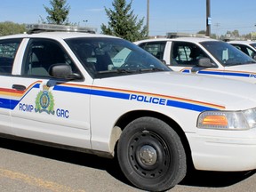Central Plains RCMP are looking for two men who robbed a youth at gun point.