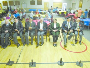 Veterans, from left, Lloyd Hughes, Hilbert Lechelt, Andy Nelson, Max Pfannmuller, June Watt, Alex McCallum, and Bud Schaupmeyer are the honoured guests at the 80th anniversary of the  Mayerthorpe Royal Canadian Legion Branch 126 on Saturday, June 22.