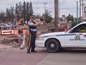 Cst. Harry Teja out along the detour route of the construction zone. It was the first of their planned enforcement operations. The speed limit along construction within the town limits are 30 km/h.