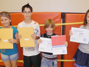 SARAH DOKTOR Delhi News-Record
Four students at Our Lady of LaSalette School were recently recognized for their writing skills as local winners of the Ontario English Catholic Teachers' Association's Young Authors Contest. From left to right, Taylor Opersko and Zachary Mels won at the local level while Carter Dwornikiewicz and Abby Springham both won at the provincial level.