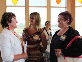 Jocelyn Turner/Daily Herald-Tribune
After officially announcing her candidacy in the upcoming Grande Prairie mayoral election at Centre 2000 Monday evening, Gladys Blackmore (left) took time to chat with those in attendance, which included supporters Amanda Hickok and Erin Haiste.