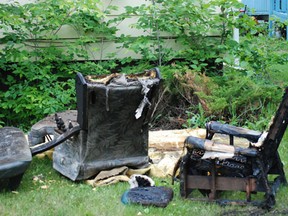 The remains of the interior of a house on MacLeod Avenue and Alberta Street were strewn on the lawn  on Saturday, June 22 after a housefire in Melfort on Friday June 21.