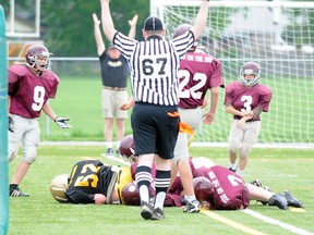 Trenton Kiwanis Tiger Cubs' Riley Sparks dives in to score the decisive touchdown in Trenton's 13-6 Belleville Minor Football League 'C' championship triumph over the Bancroft Esso on the Run T-Hawks, Saturday at M.A. Sills Park.