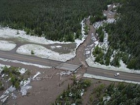 The Rocky Creek bridge along Highway 40 in Kananaskis Country washed away in flooding last week. Facebook photo from Kananaskis Public Safety