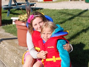 The Kincardine and District Big Brothers and Big Sisters held the annual Sailing Night on June 18, 2013. L-R: Lauren Green and Dana Daetwyler get ready for their trip on the water. (ALANNA RICE/KINCARDINE NEWS)