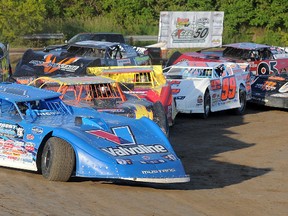 Josh Richards of Shinnston, W.Va. leads the field thru Turn 4 during World of Outlaws Late Model Series qualifying action Thursday at Brighton Speedway.