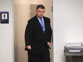 Toronto Mayor Rob Ford aide David Price walks through City Hall in Toronto, May 30, 2013. (REUTERS/Mark Blinch)