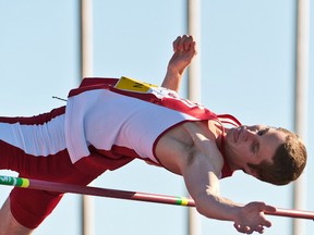 Corunna's Derek Drouin soars over the bar in the men's high jump at the 2013 Canadian track and field championships this weekend in Moncton. Drouin won the high jump with a leap of 2.31m, one of five medals won by Lambton athletes at the event. (MARC GRANDMAISON, ATHLETICS CANADA)