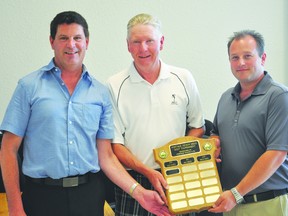 Don Jackson, centre, won the 2013 Toyota RV Portage Senior Open Championship on Monday. Jackson holds the plaque along with the GM of Portage Toyota and RV Doug Thompson, left, and sales manager Adam Trudeau. (KEVIN HIRSCHFIELD/The Graphic/QMI AGENCY)