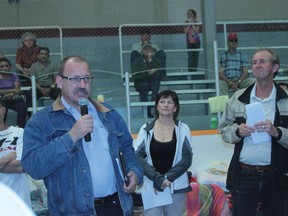 Ric McIver spoke to evacuees at a evacuation centre meeting June 24 at the Tom Hornecker Recreation Centre in Nanton.