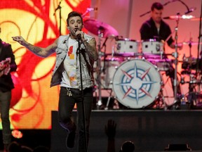 • QMI Agency
Hedley, seen here during a performance during Free the Children We Day in Calgary this past fall, will take center stage in Kirkland Lake Friday to help kickoff the first weekend of Homecoming.