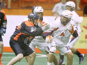 ix Nations Arrows' Joe Haodais Maracle rolls around a pick set by Johnny Powless against the Mississauga Tomahawks Tuesday during Ontario Junior A Lacrosse League action at the Iroquois Lacrosse Arena. (DARRYL G. SMART/ The Expositor/ QMI Agency)