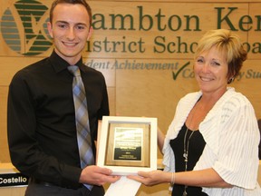 St. Clair Secondary School student Brian Grant was presented with the Jack A. MacDonald Award of Merit by LKDSB trustee Carmen McGregor Tuesday, June 25, 2013. Only one student from across the province receives the award annually from the Ontario Public School Boards' Association. (BARBARA SIMPSON, The Observer)