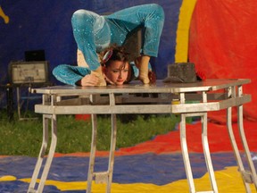 The Family Big Top Circus came to the Agricultural Society Fairgrounds outside of Peace River on June 24 and 25, 2013. Pictured: Zyda the Contortionist performs during the first show on opening night.
MICHAELA HIEBERT/PEACE RIVER RECORD-GAZETTE/QMI AGENCY