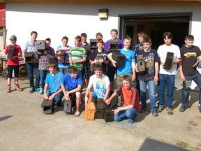 Fairview High School 8B Industrial Arts Class with the birdhouses they built for the town of Fairview, the town supplying the materials.