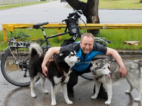 Record setting cyclists move through Airdrie