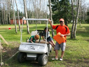 Les Bjornson with his new 'Silver Bullet' golf cart