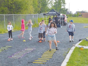 Members of the Elliot Lake Track Club train at the ELSS track twice a week, under the supervision of Allison Byles.
Photo by KEVIN McSHEFFREY/THE STANDARD/QMI AGENCY