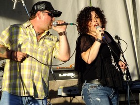 Whiskey Rain's Sean Robbins and Denise Chaulk perform at Sarnia Ribfest in June 2012. The local band will be hitting the stage at the first Beer Show set for the RBC Centre July 5 and 6. Independent breweries and regional music will be showcased at the event. Visit beershow.ca to purchase tickets. (FILE PHOTO / THE OBSERVER / QMI AGENCY)