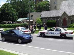 London police arrest a suspect in a stabbing incident Wednesday afternoon on Queen Ave. (JOHN LUND, The London Free Press)
